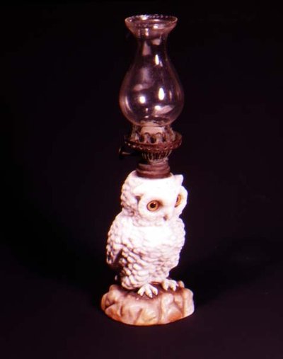Doulton owl with glass bead eyes on rock work, c.1880 by English School